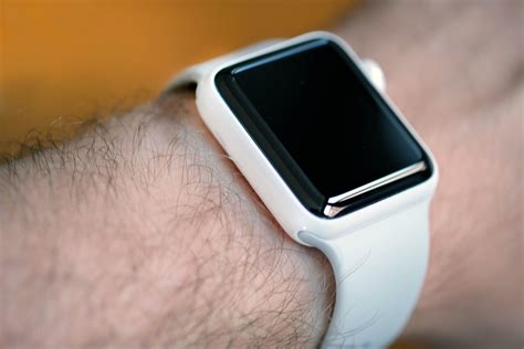 white ceramic apple watch.